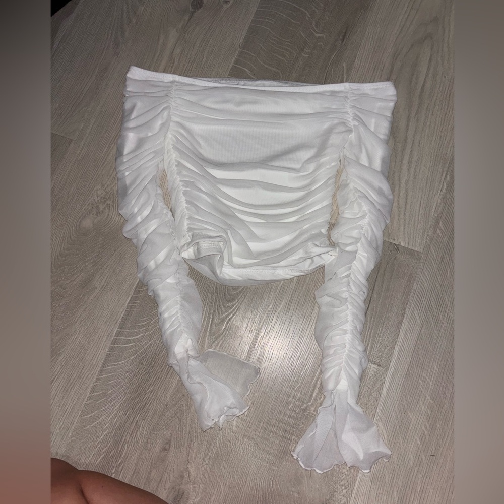 White ruffle long sleeve sheer top